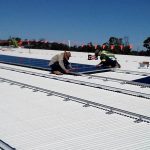 Solar Panel Installation on Commercial Rooftop MM Electrics Biloela